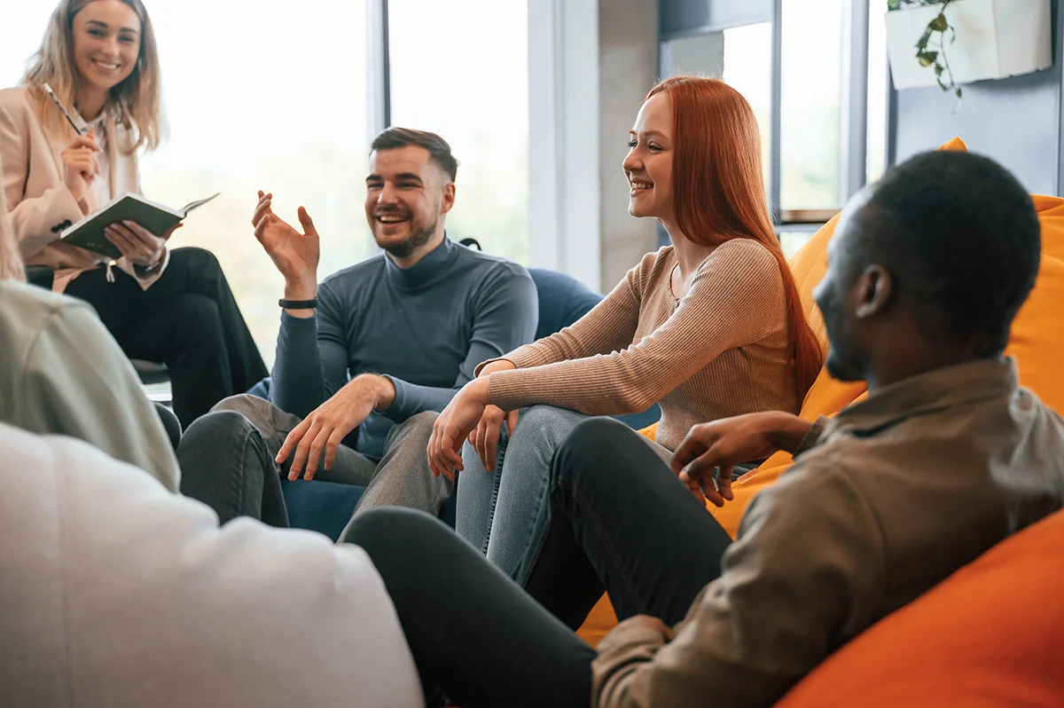 people in group therapy as part of addiction treatment
